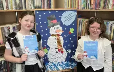 Zakończenie akcji &quot;Książki w bibliotece wypożyczamy, bałwanka w kule śniegowe ubieramy!&quot; 11