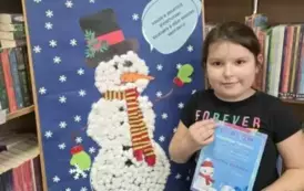 Zakończenie akcji &quot;Książki w bibliotece wypożyczamy, bałwanka w kule śniegowe ubieramy!&quot; 7