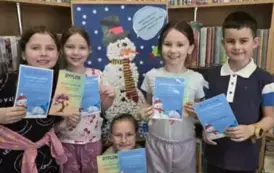Zakończenie akcji &quot;Książki w bibliotece wypożyczamy, bałwanka w kule śniegowe ubieramy!&quot; 12